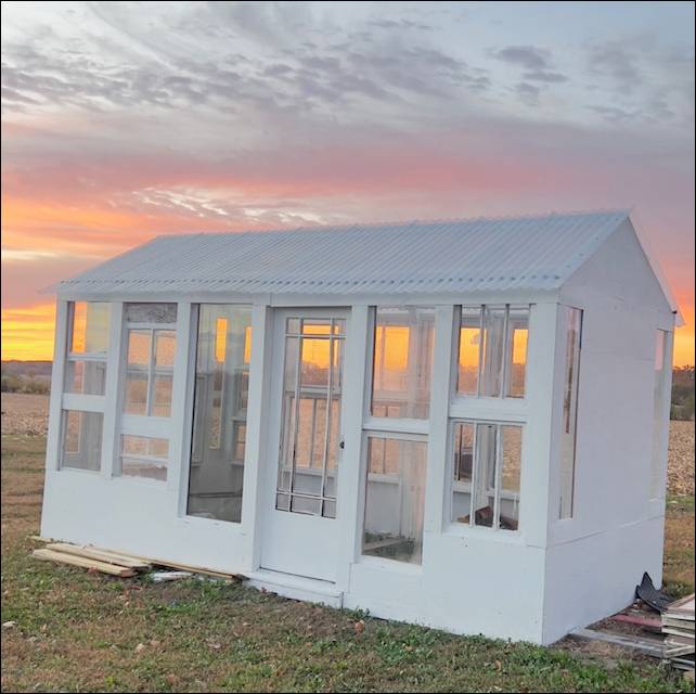 Sunshine & Lavender | Our first green house we built with repurposed material.